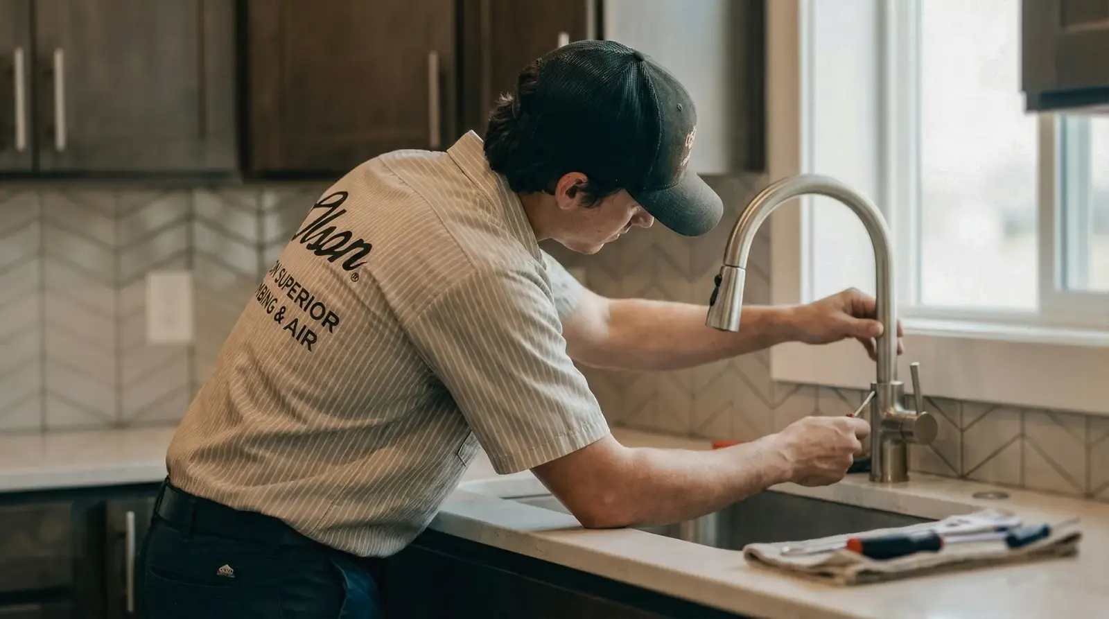 Kitchen faucet repair by Olson Superior Plumbing