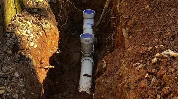 Superior Plumbing sewer pipe in an open trench