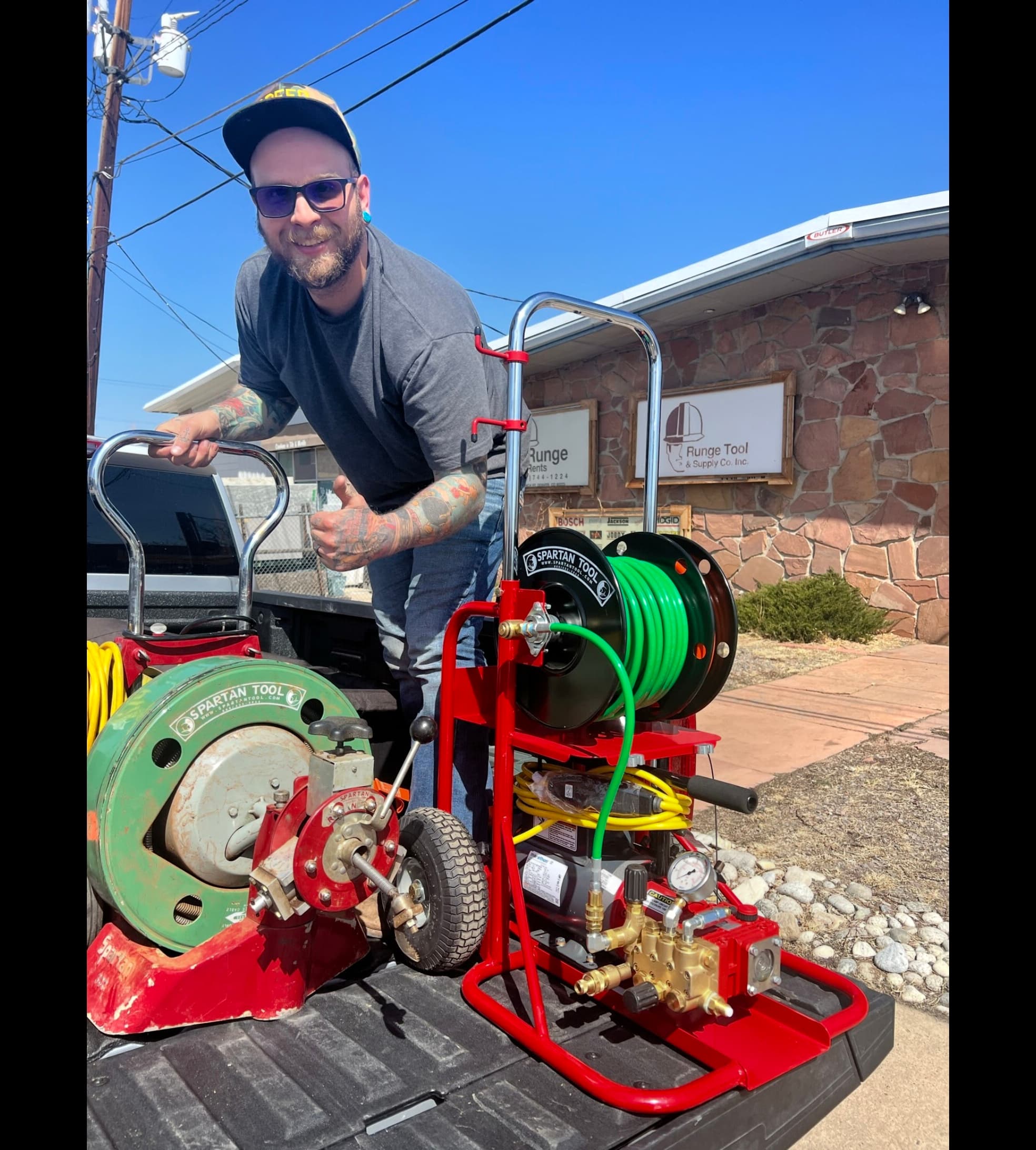 Nick Velasquez with sewer jetting and drain cleaning equipment