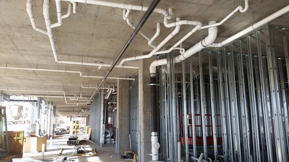 The Mint Town Center at Stapleton - Plumbing project photo 48