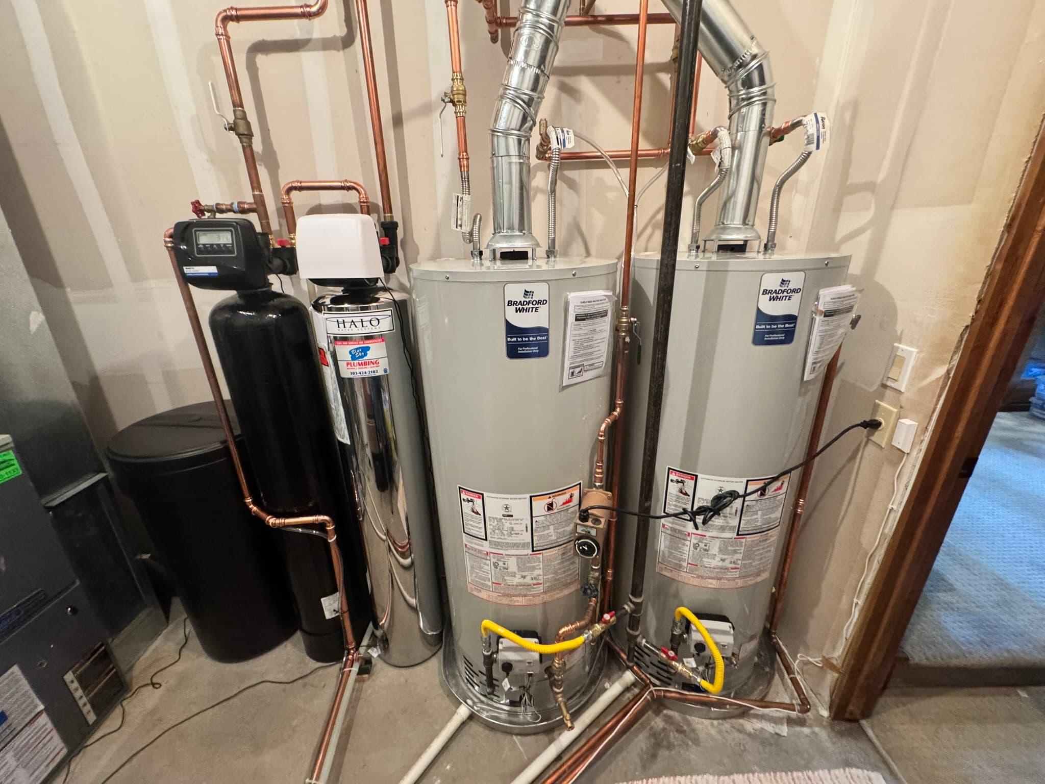 Dual water heater with softener installation in Golden