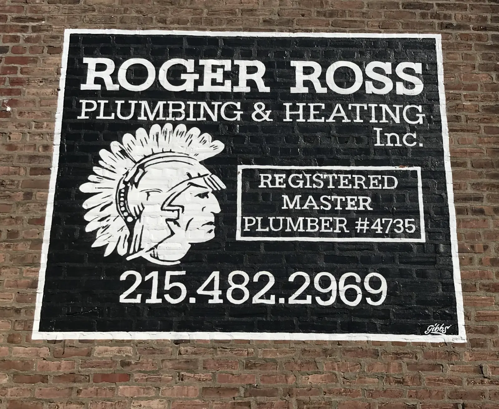 Roger Ross Plumbing shop wall